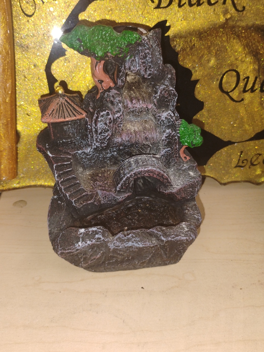 Rustic Brown Resin Waterfall Candle Holder with Green Accents